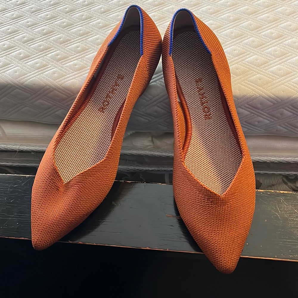 Rothy’s burnt orange pointy flats.